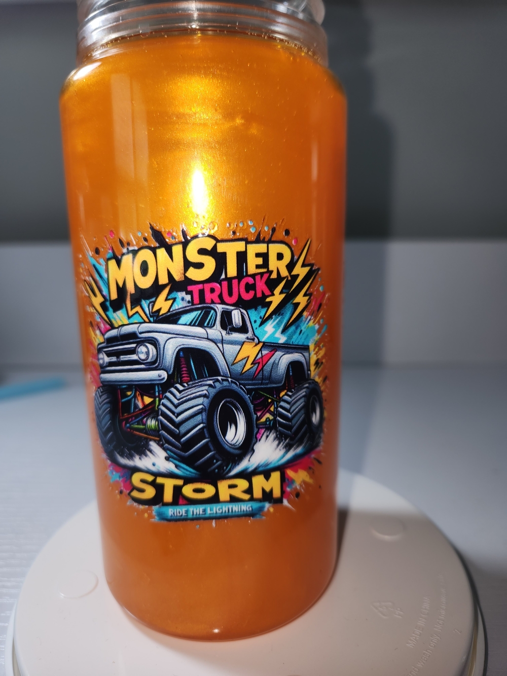 Monster Truck Storm Shimmering Orange Tumbler